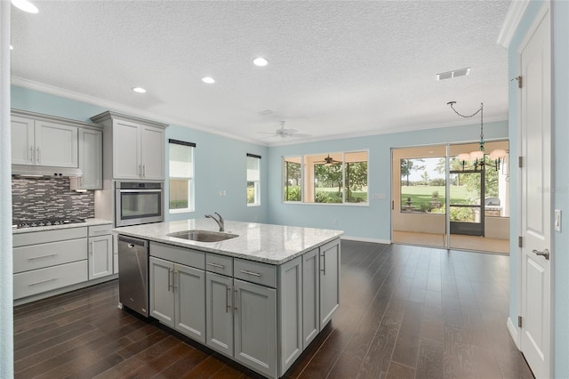 9805 SW 95th Loop, Ocala, FL 34481 - kitchen with stainless steel appliances, a sink, gray cabinets, dark wood-style flooring, and ornamental molding