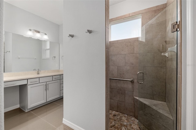 9805 SW 95th Loop, Ocala, FL 34481 - bathroom with vanity, a stall shower, tile patterned flooring, and baseboards