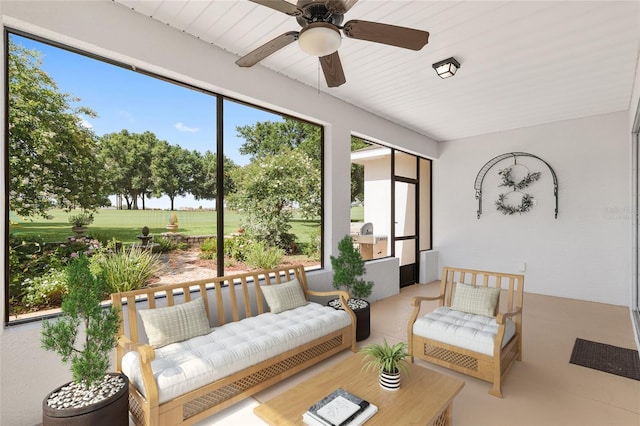 9805 SW 95th Loop, Ocala, FL 34481 - sunroom / solarium featuring ceiling fan and an outdoor hangout area