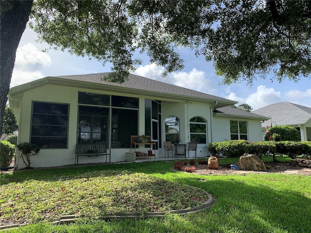 11605 SW 69th Cir, Ocala, FL 34476 - view of front of house with a front lawn and stucco siding