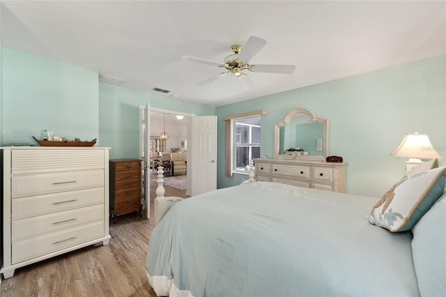 11051 SW 73rd Ct, Ocala, FL 34476 - bedroom featuring wood finished floors and ceiling fan