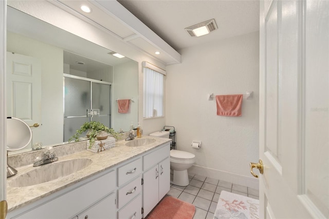 11051 SW 73rd Ct, Ocala, FL 34476 - bathroom with a shower stall, tile patterned floors, baseboards, double vanity, and toilet