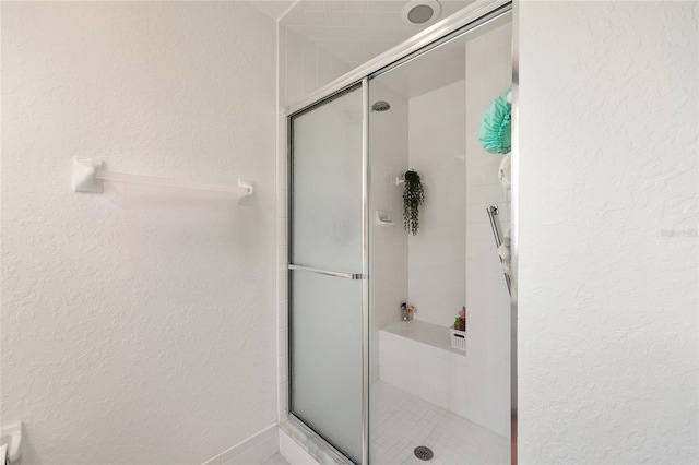 11051 SW 73rd Ct, Ocala, FL 34476 - full bath featuring a stall shower and a textured wall