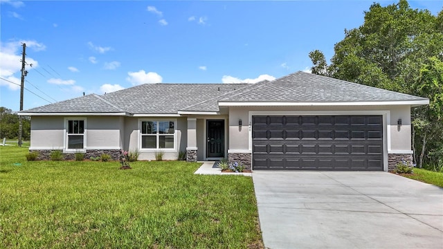 226 Locust Ln, Ocala, FL 34472 - view of front of home with stone siding, stucco siding, an attached garage, a front yard, and driveway