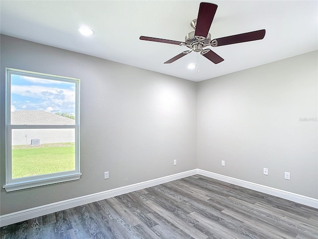 226 Locust Ln, Ocala, FL 34472 - empty room featuring wood finished floors, a ceiling fan, and recessed lighting