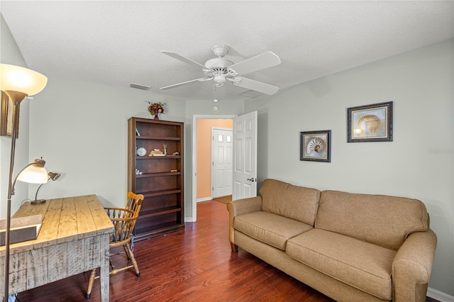 1204 Flamingo Pl, The Villages, FL 32162 - home office with wood finished floors, ceiling fan, baseboards, and a textured ceiling