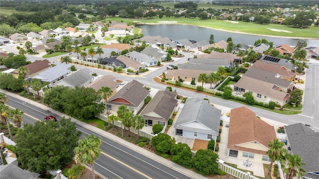1204 Flamingo Pl, The Villages, FL 32162 - aerial view of residential area featuring a nearby body of water and a golf course