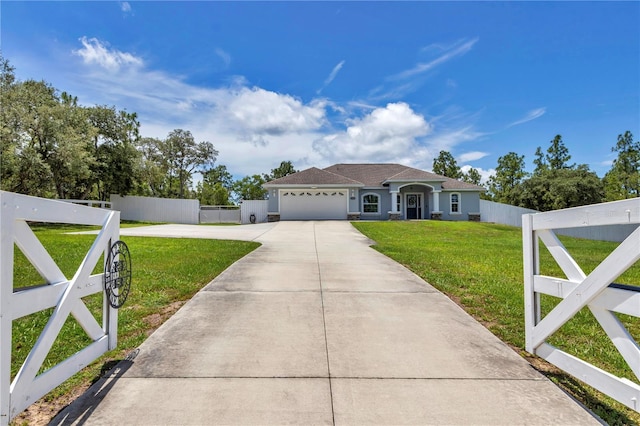 12392 SW 85th Pl, Dunnellon, FL 34432 - ranch-style home with driveway and a garage