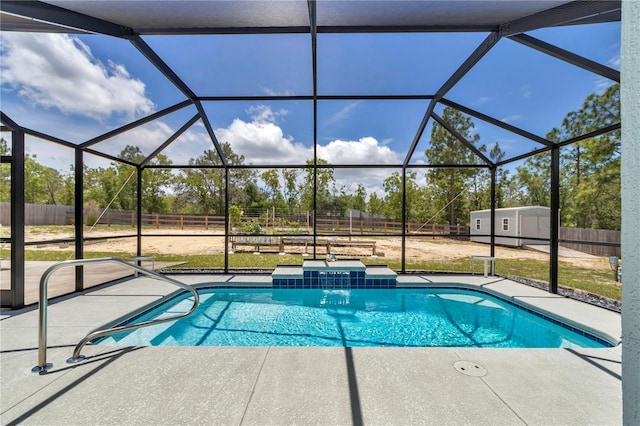 12392 SW 85th Pl, Dunnellon, FL 34432 - view of swimming pool featuring a patio area, a shed, a fenced backyard, and a lanai