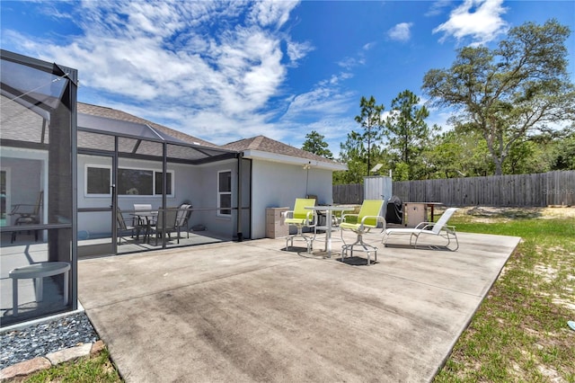 12392 SW 85th Pl, Dunnellon, FL 34432 - view of patio with a lanai and outdoor dining space