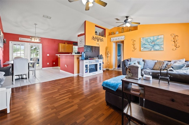 32 Dogwood Drive Loop, Ocala, FL 34472 - living room with lofted ceiling, a ceiling fan, and light wood-style flooring