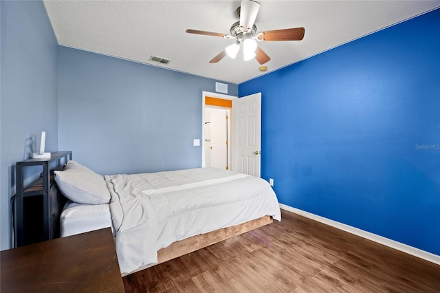 32 Dogwood Drive Loop, Ocala, FL 34472 - bedroom with wood finished floors and a ceiling fan