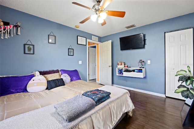 32 Dogwood Drive Loop, Ocala, FL 34472 - bedroom with wood finished floors, a closet, and ceiling fan