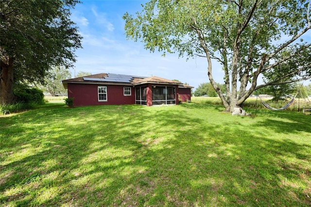 32 Dogwood Drive Loop, Ocala, FL 34472 - view of green lawn with a sunroom