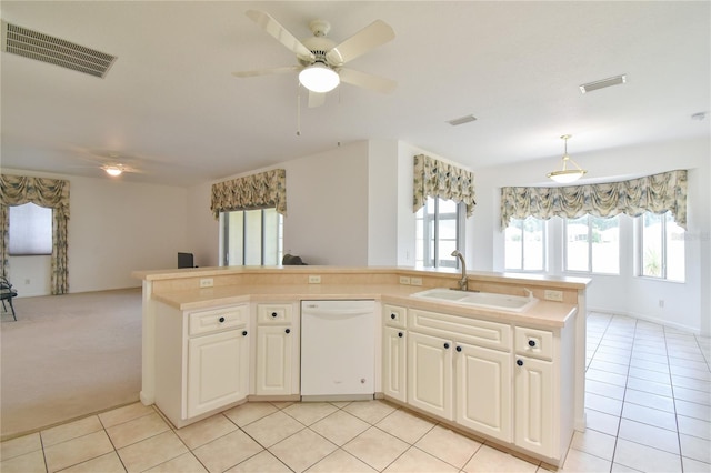 5551 NW 25th Loop, Ocala, FL 34482 - kitchen with white dishwasher, ceiling fan, open floor plan, and light tile patterned floors