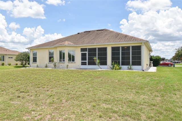 5551 NW 25th Loop, Ocala, FL 34482 - back of house with a lawn and stucco siding