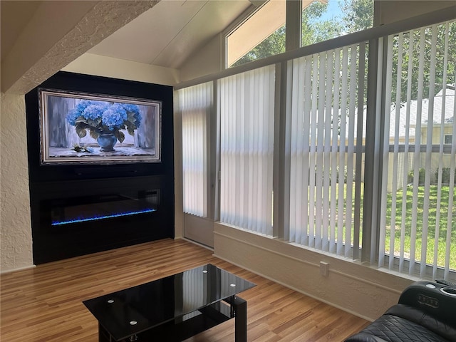 9255 SW 90th Ct Unit B, Ocala, FL 34481 - sunroom featuring vaulted ceiling and healthy amount of natural light