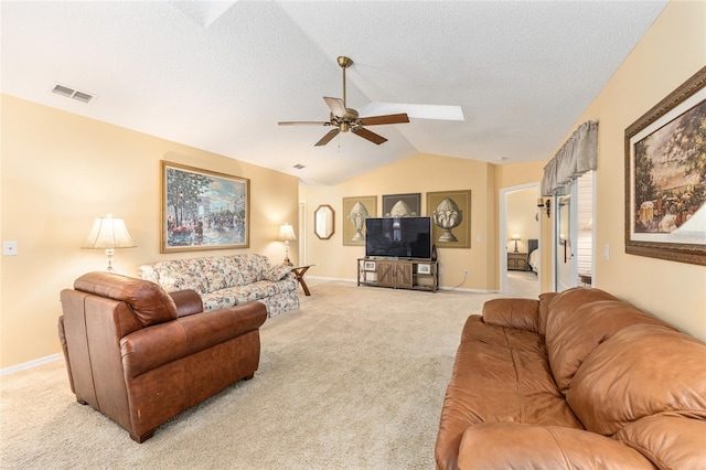 8554 SW 63rd Ct, Ocala, FL 34476 - living area with lofted ceiling, light colored carpet, a ceiling fan, and a textured ceiling