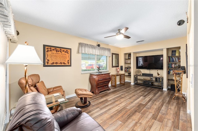 8554 SW 63rd Ct, Ocala, FL 34476 - living room with a ceiling fan and wood finished floors