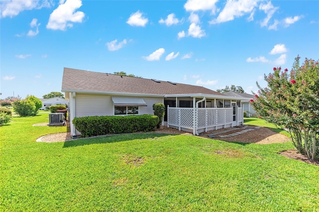 8554 SW 63rd Ct, Ocala, FL 34476 - back of house featuring a sunroom and a yard