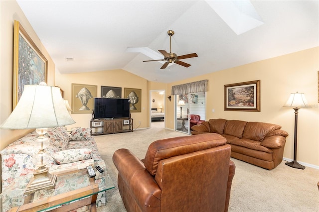 8554 SW 63rd Ct, Ocala, FL 34476 - living area featuring light colored carpet, vaulted ceiling, a skylight, and ceiling fan