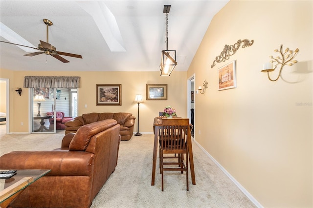 8554 SW 63rd Ct, Ocala, FL 34476 - living room featuring light colored carpet, vaulted ceiling, and ceiling fan