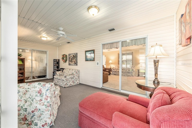 8554 SW 63rd Ct, Ocala, FL 34476 - living area with a ceiling fan, carpet, and wooden walls