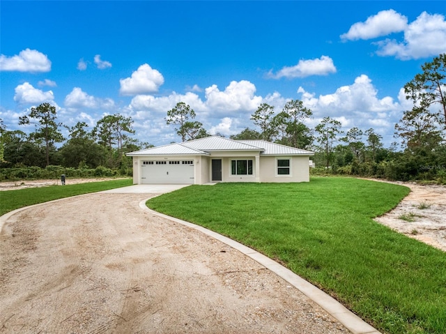 9131 Canter Path, Sebring, FL 33870 - view of front facade with driveway, stucco siding, a garage, a front yard, and a metal roof