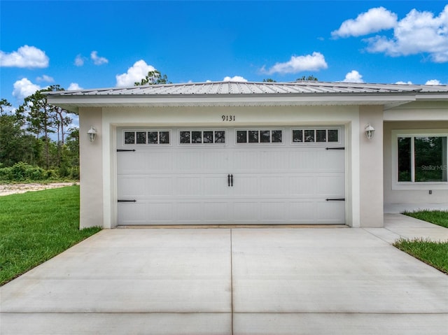 9131 Canter Path, Sebring, FL 33870 - garage featuring driveway