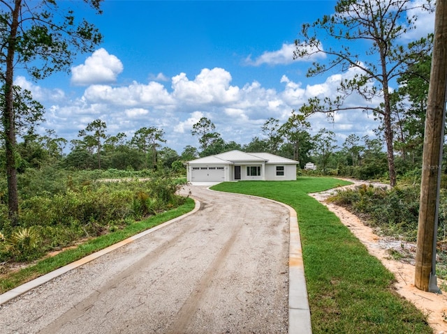9131 Canter Path, Sebring, FL 33870 - single story home with dirt driveway, an attached garage, and a front yard
