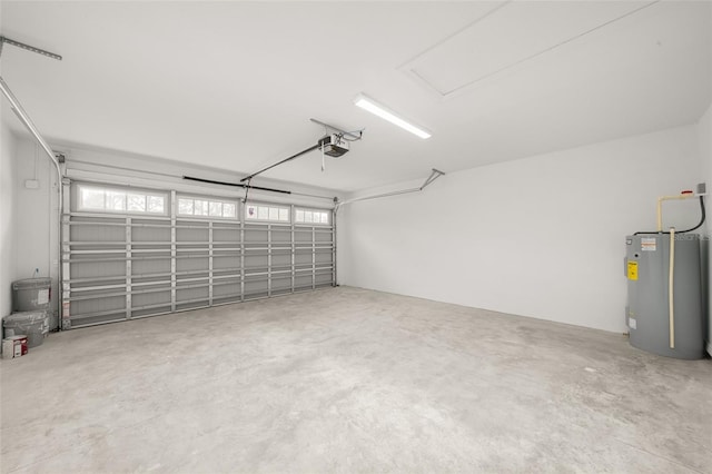 9131 Canter Path, Sebring, FL 33870 - garage featuring electric water heater and a garage door opener