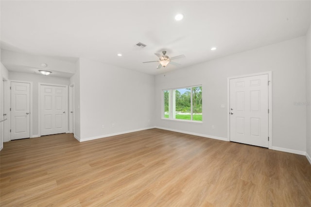 9131 Canter Path, Sebring, FL 33870 - unfurnished room with light wood finished floors, a ceiling fan, and recessed lighting
