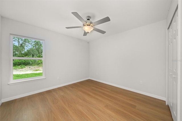 9131 Canter Path, Sebring, FL 33870 - unfurnished bedroom with a closet, light wood-type flooring, and a ceiling fan