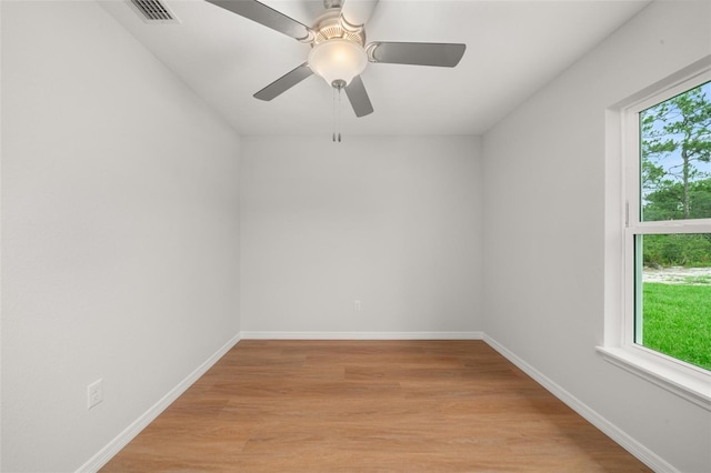 9131 Canter Path, Sebring, FL 33870 - unfurnished room featuring light wood-style flooring and ceiling fan