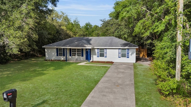 2263 Moines Ct, Dunnellon, FL 34431 - ranch-style home with a front lawn, concrete driveway, and roof with shingles