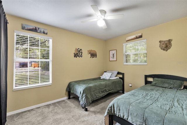 2263 Moines Ct, Dunnellon, FL 34431 - bedroom with carpet floors, baseboards, and ceiling fan