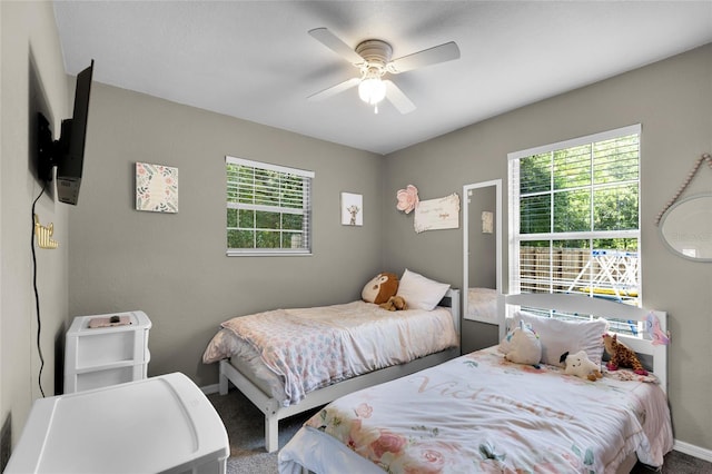 2263 Moines Ct, Dunnellon, FL 34431 - bedroom featuring carpet, baseboards, and a ceiling fan