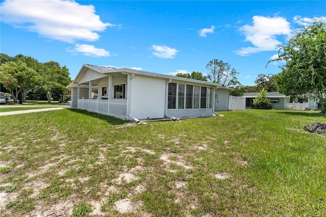 10210 SW 93rd Ave, Ocala, FL 34481 - view of side of property with a lawn