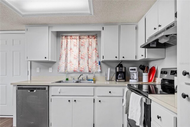 10210 SW 93rd Ave, Ocala, FL 34481 - kitchen with stainless steel appliances, under cabinet range hood, light countertops, white cabinetry, and a textured ceiling