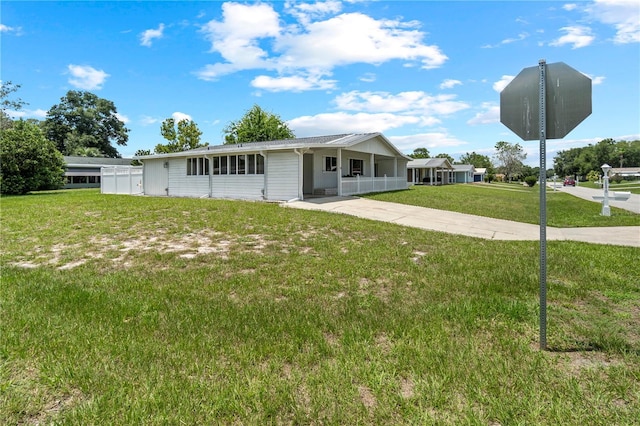 10210 SW 93rd Ave, Ocala, FL 34481 - ranch-style house with concrete driveway