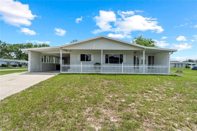 10210 SW 93rd Ave, Ocala, FL 34481 - view of front facade with concrete driveway and an attached carport