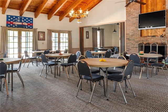 10210 SW 93rd Ave, Ocala, FL 34481 - dining room featuring carpet floors, a wood ceiling with exposed beams, french doors, a wainscoted wall, and high vaulted ceiling
