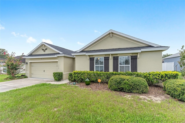 6646 SW 64th Ave, Ocala, FL 34476 - single story home with stucco siding, a front yard, concrete driveway, and an attached garage