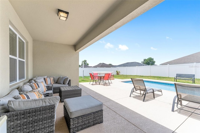 6646 SW 64th Ave, Ocala, FL 34476 - fenced backyard with outdoor lounge area, outdoor dining space, and a patio