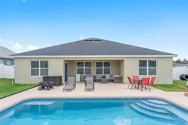 6646 SW 64th Ave, Ocala, FL 34476 - rear view of house with an outdoor living space, a jacuzzi, stucco siding, a shingled roof, and a patio