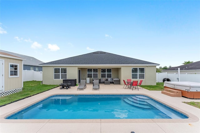 6646 SW 64th Ave, Ocala, FL 34476 - view of swimming pool with a hot tub, an outdoor hangout area, a patio area, and a fenced backyard