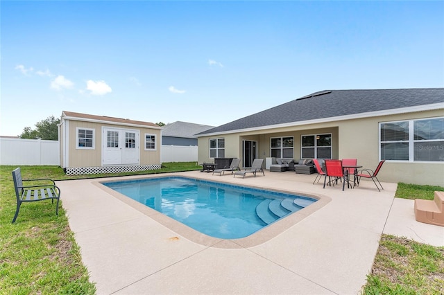 6646 SW 64th Ave, Ocala, FL 34476 - view of pool with a patio area, an outdoor structure, and an outdoor living space