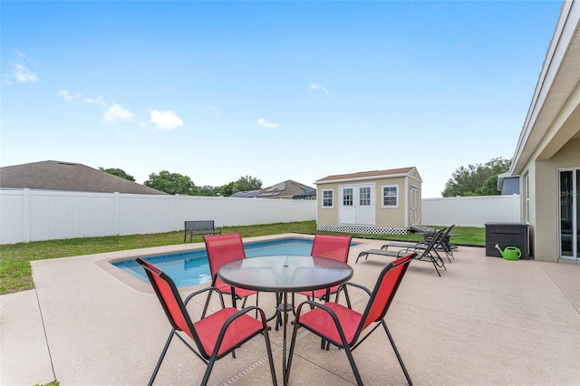 6646 SW 64th Ave, Ocala, FL 34476 - fenced backyard featuring a patio, outdoor dining area, and a shed