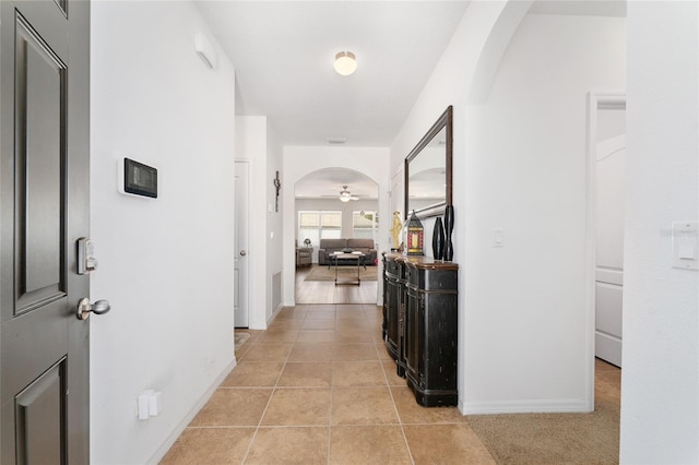 6646 SW 64th Ave, Ocala, FL 34476 - hallway featuring arched walkways and light tile patterned floors
