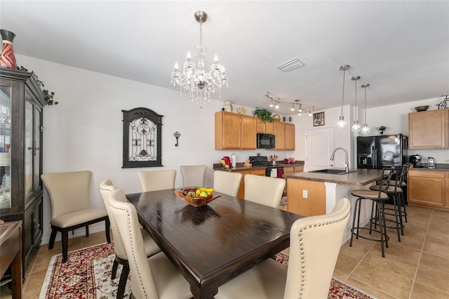 6646 SW 64th Ave, Ocala, FL 34476 - dining area with light tile patterned floors and a chandelier